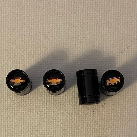 Chevrolet valve Stem caps in black set of 4 with Logo NWT - Picture 4 of 5